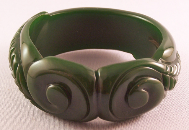 BB120 scroll carved green bakelite bangle